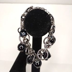 Silver metal with faceted black bead charms